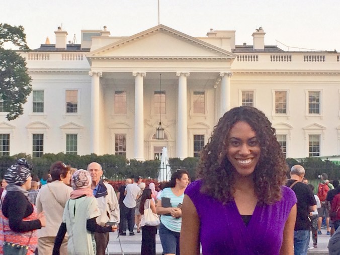 Jessica stands by white house